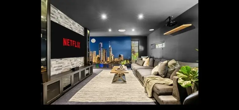 Prestige Gold Coast home with luxurious carpet in media room, installed by Evolved Floors